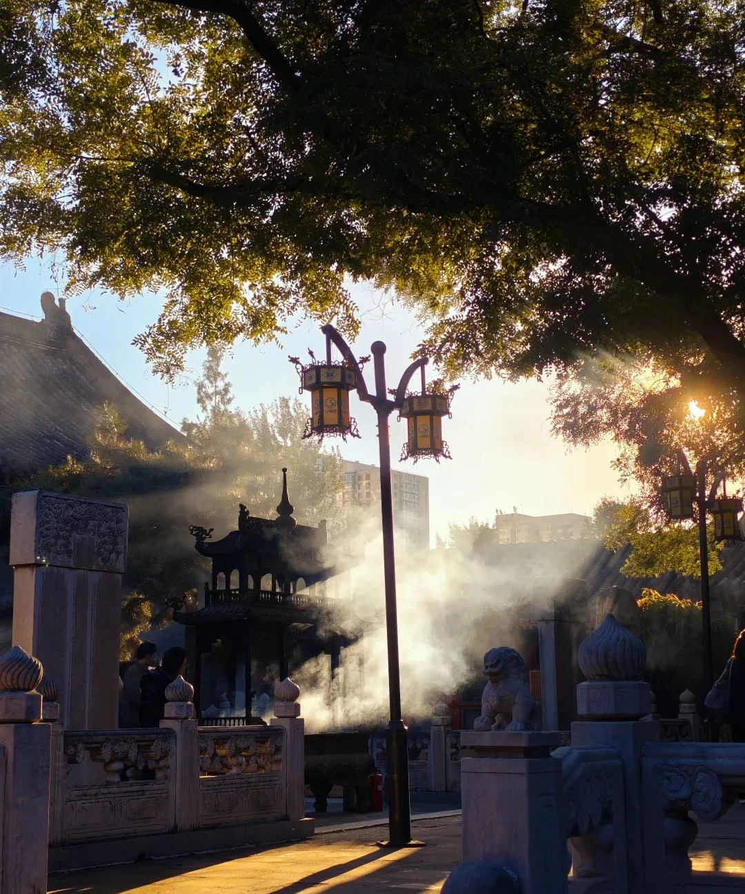 The grey tiles and red walls of White Cloud Temple