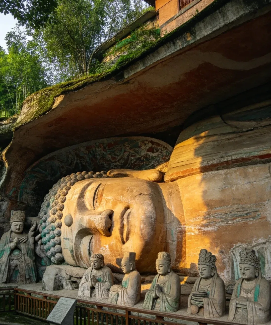 The Thousand-Hand Guanyin at Baoding, statues layered across the cliff wall.
